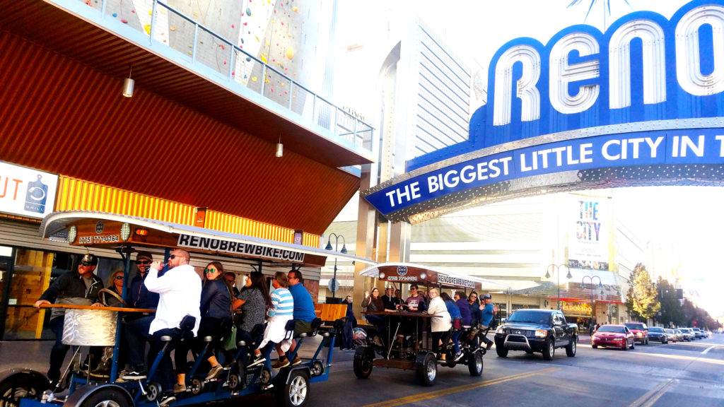 A large Brew Bike reservation under the Reno Arch.