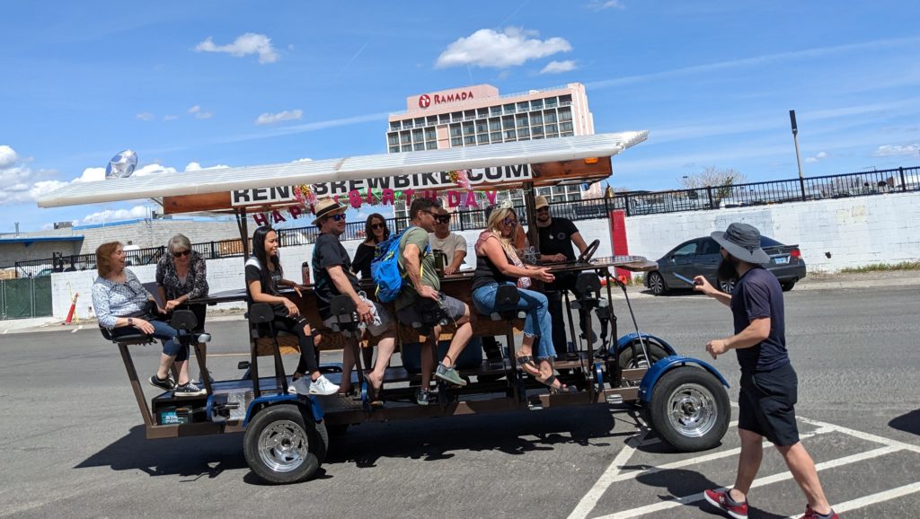 Reno Brew Bike parked with Birthday Party passengers on it