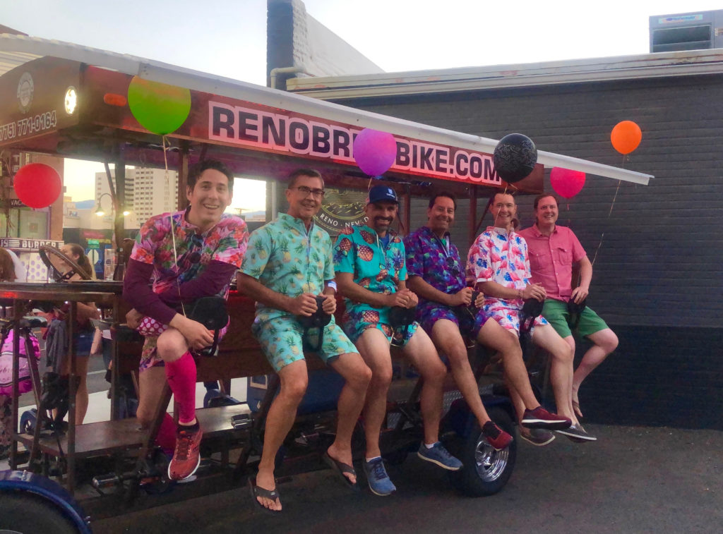 A bachelor party sitting on Brew Bike Seats